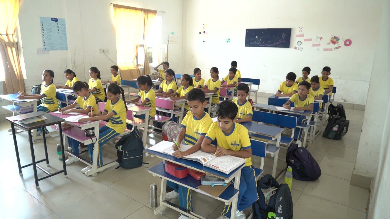 Students learning in their classroom